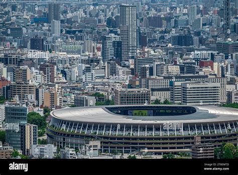National Stadium Tokyo Surrounded By Buildings Stock Photo Alamy