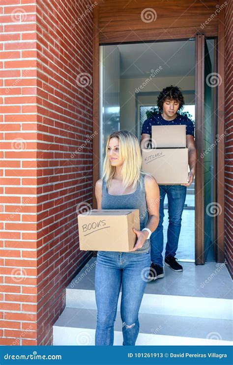 Couple Moving Carrying Cardboard Boxes Stock Image Image Of Male