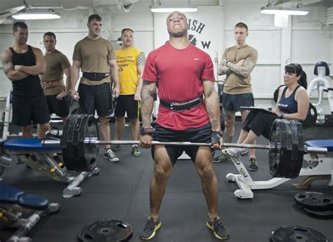 Weight Lifting Competition In The Gym