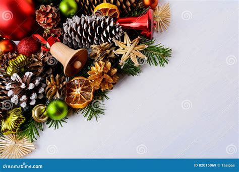 Christmas Greeting Card With Fir Branches And Wooden Jingle Bell Stock