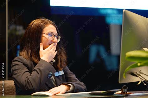 Hotel Manager A Brunette Woman Reception Shocked Sitting In Front Of