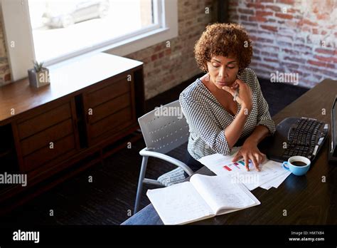 Mature Businesswoman Working In Office Stock Photo Alamy