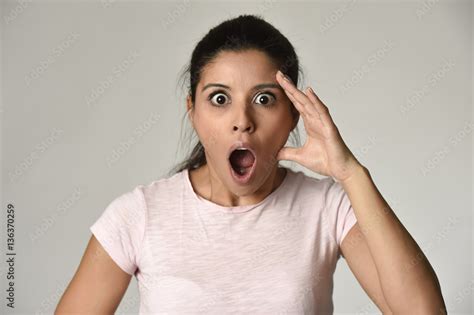 Young Beautiful Surprised Woman Amazed In Shock And Surprise With Mouth