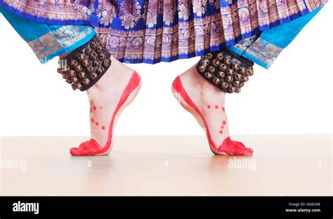Traditional Dancers Feet Performing Bharatanatyam Over White