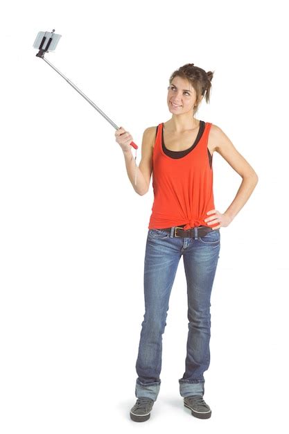 Premium Photo Casual Brunette Using Selfie Stick