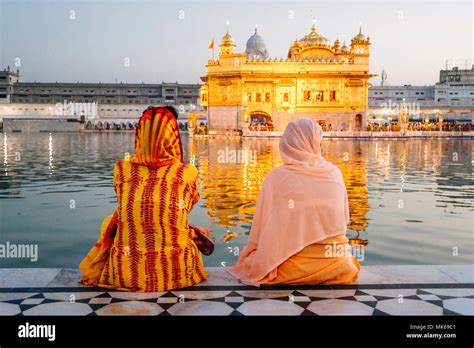 Amritsar Punjab India Two Sikh Pilgrim Women Sit Looking At The