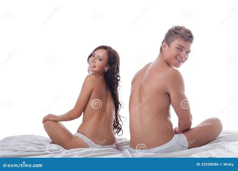 Smiling Half Naked Man And Woman Posing In Bed Stock Photo Image Of Amorous Desire