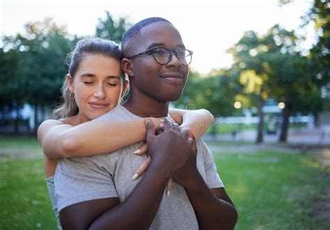 Love Peace Or Couple Of Friends Hug In A Park Bonding On A Relaxing