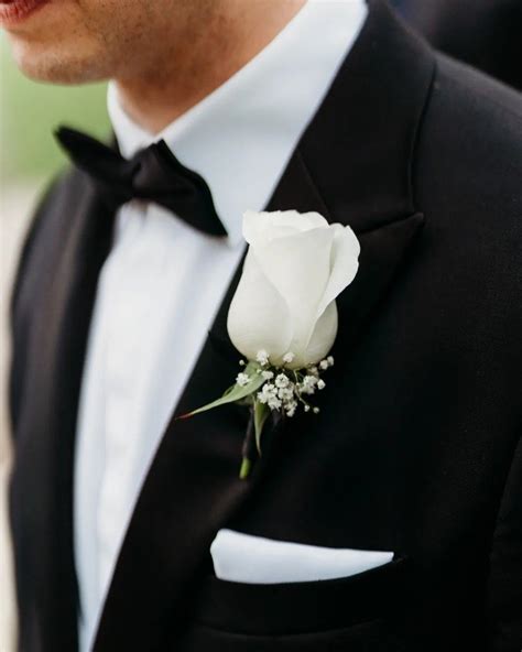 Classic White Rose Gypsophila Buttonhole For A Black Tie Wedding