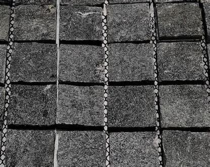 Black Natural Split Cobblestones On Mesh Sheet By Stone Pavers Australia