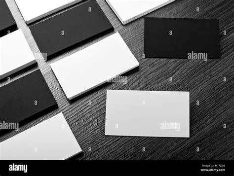 Mockup Of White And Black Business Cards At Wooden Background Template