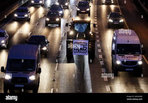 A Tractor Among Traffic On The M50 In Dublin As A Protest By Farmers