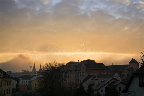 Sunrise Or Sunset Over The Town Beautiful Colorful Clouds Over The