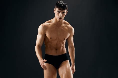 Premium Photo Attractive Man With Muscled Nude Body In Black Panties Based Studio High Quality