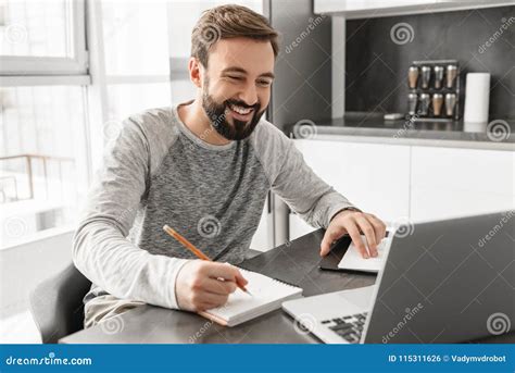 Photo Of Successful Mature Man 30s In Casual Clothing Smiling An Stock