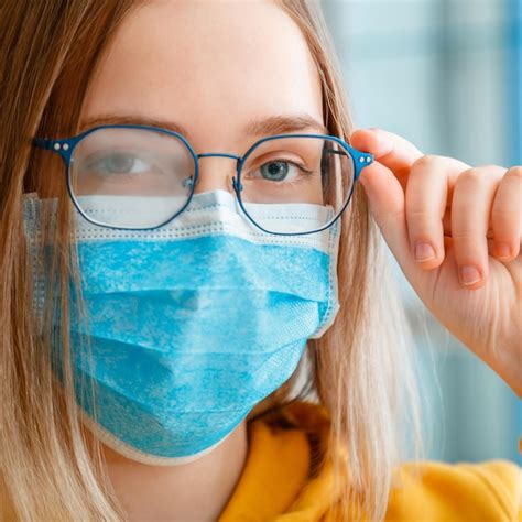 Premium Photo Foggy Glasses Wearing On Young Woman Close Up Portrait