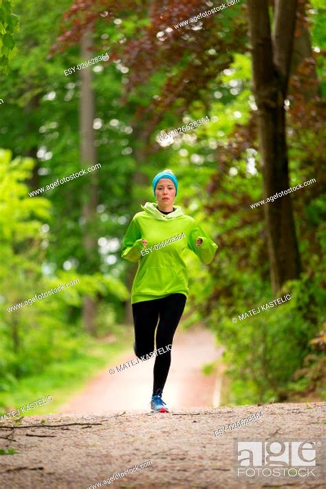 Sporty Young Female Runner In Forest Running Woman Female Runner