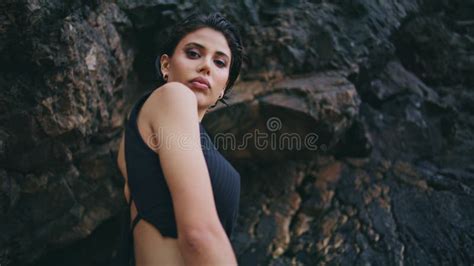 Confident Brunette Posing Rocks At Seashore Closeup Fashion Model Look Camera Stock Footage