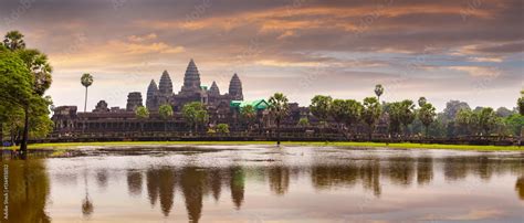 Angkor Wat temple with reflecting in water. Panoramic view Stock Photo ...