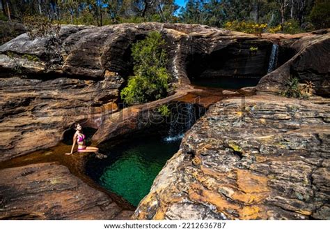 Beautiful Girl Pink Bikini Sits By Stock Photo 2212636787 Shutterstock