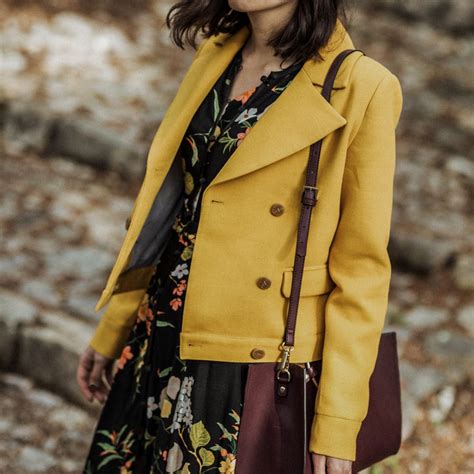 A Yellow Jacket And A Floral Dress Yellow Jacket Outfit Jackets