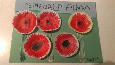 Rememberance Day Poppies Made From Cupcake Liners And Popsicle Sticks