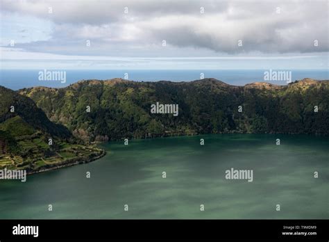 aerial landscape of the impressive volcanic crater with Lagoa Azul at ...