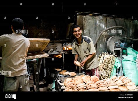 A Visit To One Of The Many Pita Bread Bakeries In Cairo Stock Photo Alamy
