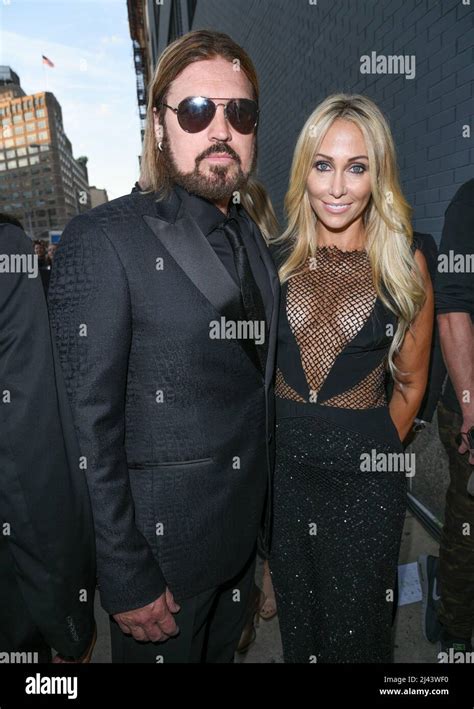 Billy Ray Cyrus And Tish Cyrus Attend The 2015 AmfAR Inspiration Gala