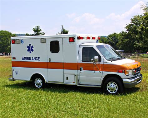 Ambulance | Free Stock Photo | An ambulance parked on the grass | # 12828