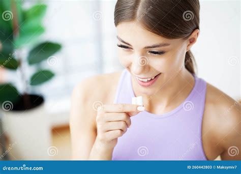 Smiling Beautiful Young Woman Eating Chewing Gum Stock Image Image Of