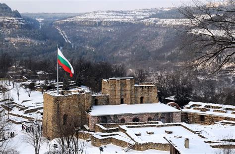 Bulgaria - Veliko Tarnovo - National Bulgarian flag is waving over medieval Tsarevets stronghold ...