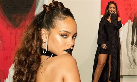 Rihanna Oozes Sex Appeal As She Unveils Her Long Awaited Album Cover