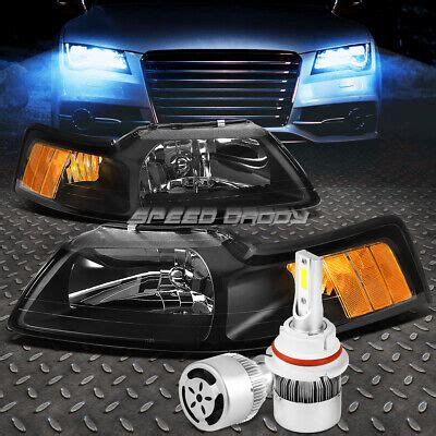 BLACK HOUSING HEADLIGHT AMBER CORNER WHITE LED 9007 HID W FAN FOR 99 04