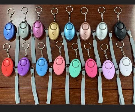 Wholesale 130db Egg Shape Self Defense Alarm Loud Keychain Girl Women