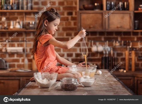 Little Girl Baking Pastry — Stock Photo © Igortishenko 143392747