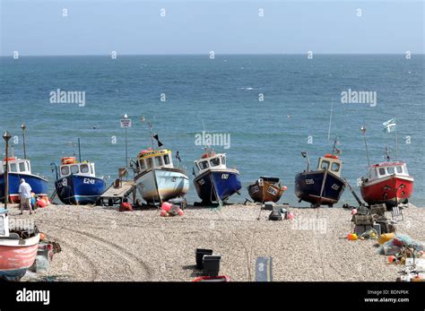 Fishing Boats On The Shingle Beach At Beer Devon England Stock Photo