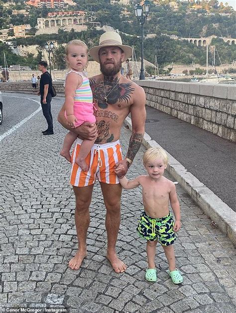 Conor McGregor dotes on his son Conor Jr as he enjoys yacht break ...