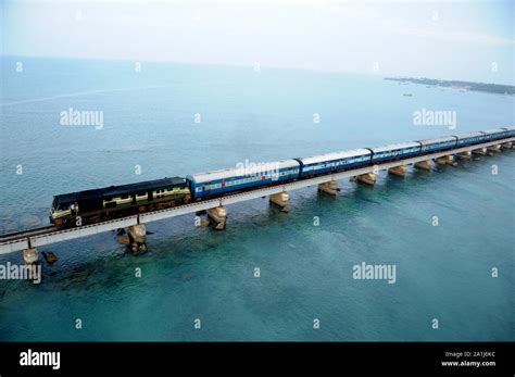 RAMESHWARAM Tamil Nadu, India - A train pass through the Pamban bridge ...