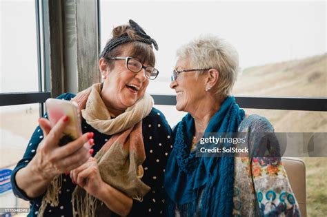 Old Friends Catching Up High-Res Stock Photo - Getty Images