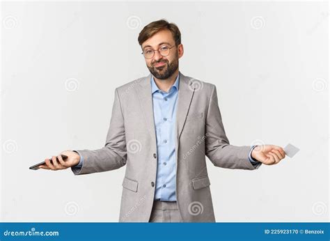 Image Of Clueless Smiling Businessman In Glasses And Gray Suit Spread