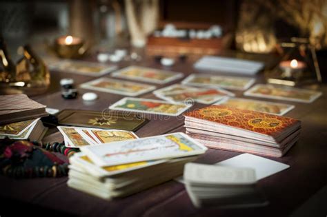 Tarot Card Reader Arranges Cards In A Card Spread Fortune Telling