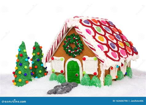 Christmas Gingerbread House In Snow Isolated On White Stock Photo