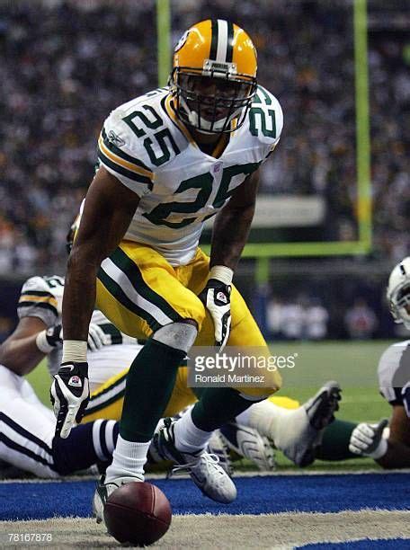 Running Back Ryan Grant Of The Green Bay Packers Celebrates A Touchdown