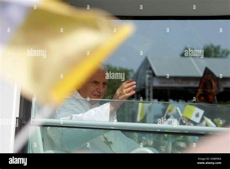 Pope Benedict Xvi Waves To Believers As He Arrives In His Popemobile