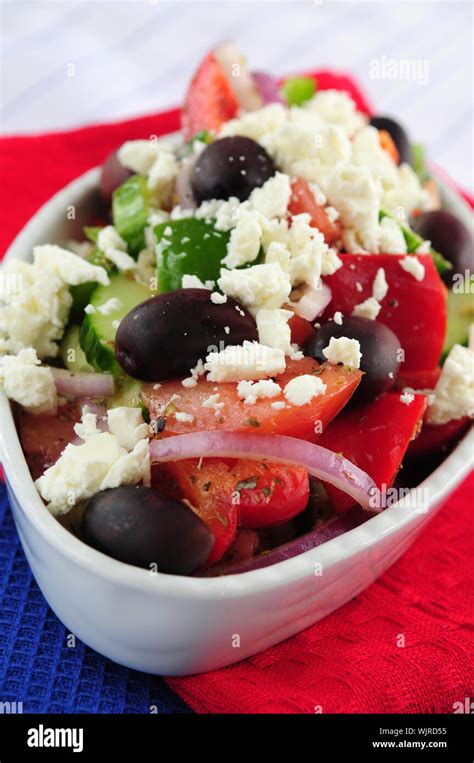 Greek salad with feta cheese and black kalamata olives Stock Photo - Alamy