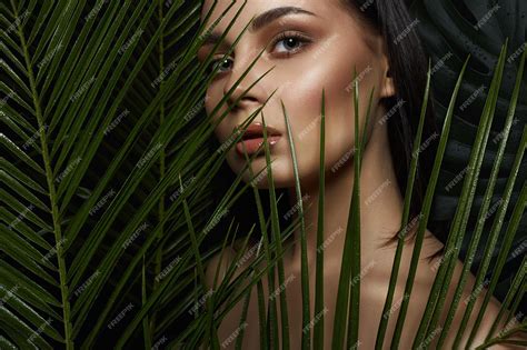 Premium Photo Wild Woman In Jungle Beautiful Girl In Palms Makeup