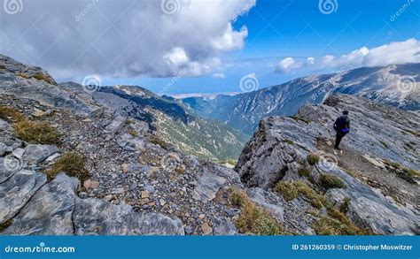 Man Trekking On Mystical Hiking Trail Leading To Mount Olympus Mytikas