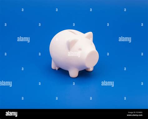 Pink Piggy Bank On Blue Background Stock Photo Alamy