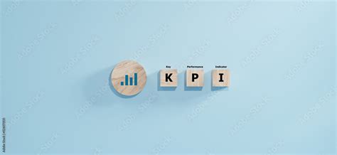 KPI Key Performance Indicator Businessman Holding Wooden Cube With